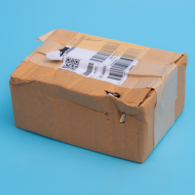 damaged box light blue background FBA Fulfillment Centers can save Small Business money