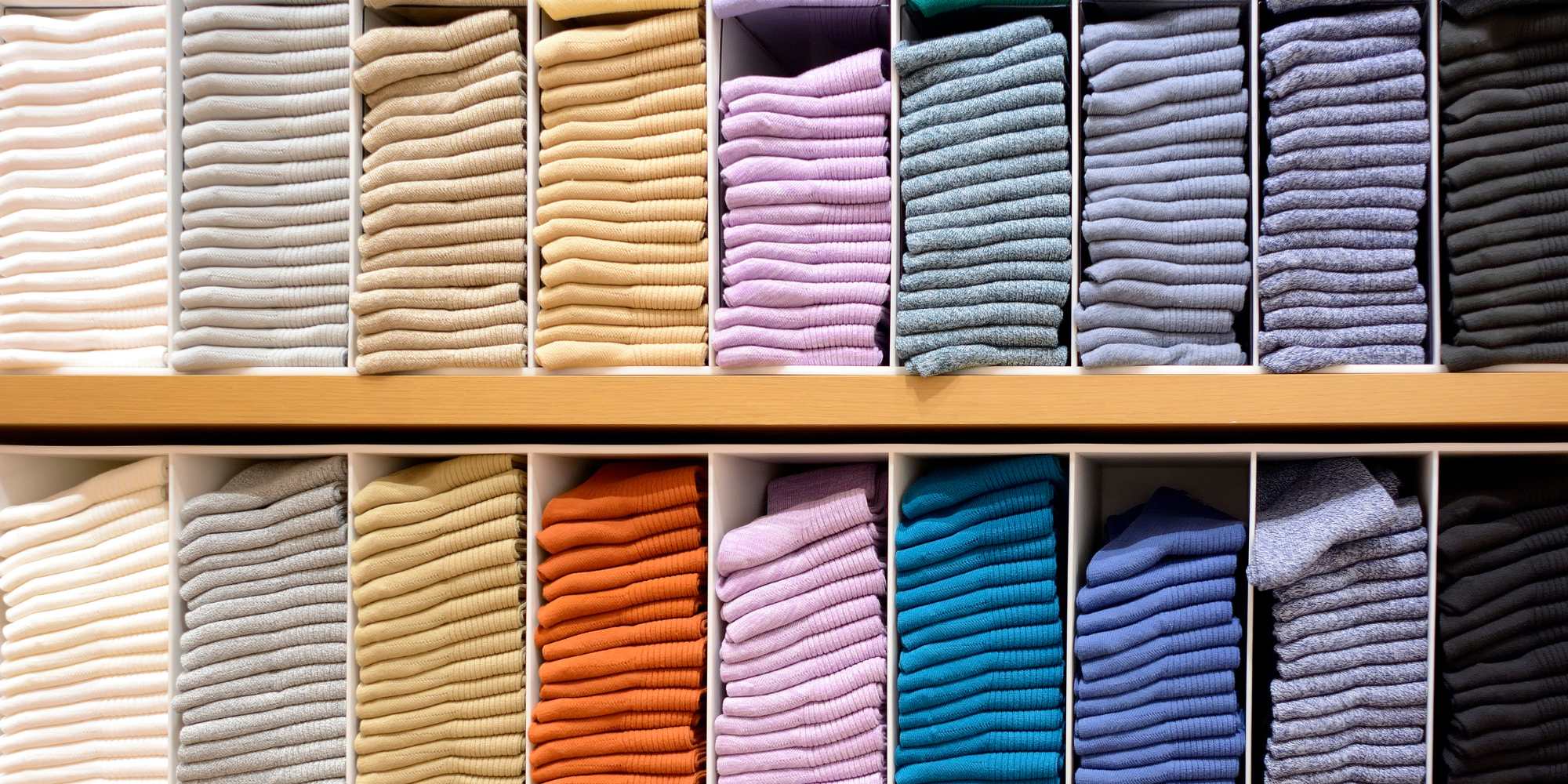 photo of person labeling a box on a desk
